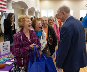 Sen. Kevin Kelly welcomes attendees at the Senior Health and Wellness Fair.